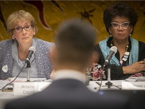 Co-presidents of Montreal's office of public consultations on the issues of systemic racism and discrimination, Maryse Alcindor, right, and Ariane Emond during a public hearing on Nov. 4, 2019.