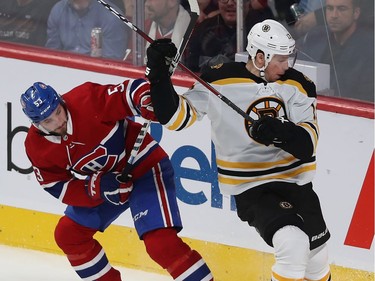 Canadiens Victor Mete (53) mixes it up with Boston Bruins Charlie Coyle (13), during third period NHL action in Montreal on Tuesday November 5, 2019.