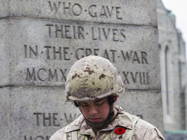 Private Wilfred-Jason Magadan serves as a sentinel during  the Remembrance Day ceremony at the Westmount Cenotaph in Montreal on Sunday, Nov. 10, 2019.