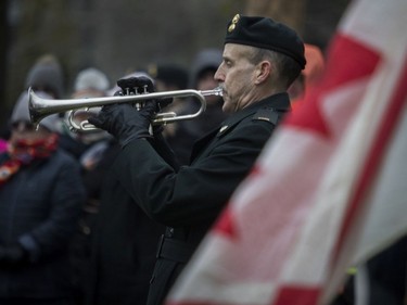 The Last Post is played during  the Remembrance Day ceremony at the Westmount Cenotaph in Montreal on Sunday, Nov. 10, 2019.
