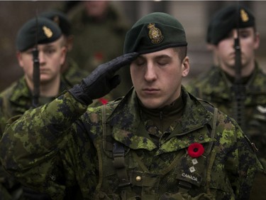 Captain Louis-Philip Rousseau-Filteau closes his eyes during the Last Post at the Remembrance Day ceremony at the Westmount Cenotaph in Montreal on Sunday, Nov. 10, 2019.