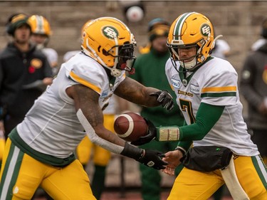 Edmonton Eskimos quarterback Trevor Harris hands off to running back C.J. Gable during CFL Eastern Semi-Final action at Molson Stadium in Montreal on Sunday, Nov. 10, 2019.