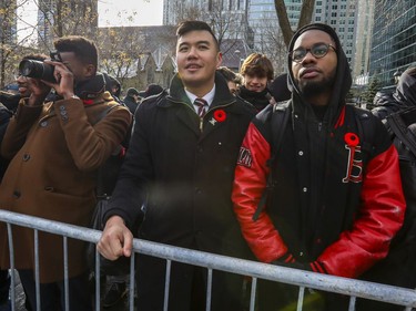 Gregory Calanges, left, Vinh Du and Léo Annette of the Sigma Theta Pi fraternity at Université de Montreal during Remembrance Day ceremony at Place du Canada in Montreal on Monday, Nov. 11, 2019.