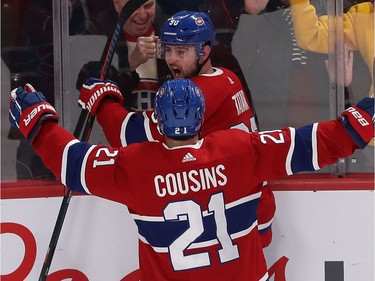 Montreal Canadiens Tomas Tatar (90) celebrates goal with Nick Cousins (21) against the Columbus Blue Jackets during third period NHL action in Montreal on Tuesday November 12, 2019.