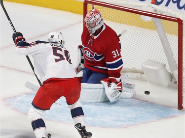 Columbus Blue Jackets Eric Robinson (50) scores on Montreal Canadiens goaltender Carey Price during first period NHL action in Montreal on Tuesday November 12, 2019.