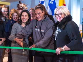 Mayor Valerie Plante and Putulik Qumak cut the ribbon at the Resilience Montreal day shelter and wellness centre in Westmount on Thursday November 14, 2019.