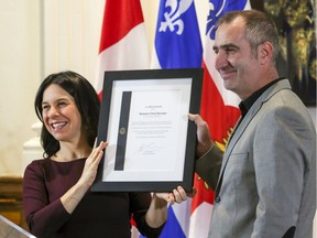 Mayor Valérie Plante presented a certificate of recognition to Erick Marciano, the SUV driver who used his car to block a speeding car from potentially ramming into pedestrians at a downtown intersection last week, in Montreal Monday November 18, 2019. (John Mahoney / MONTREAL GAZETTE) ORG XMIT: 63502 - 7112