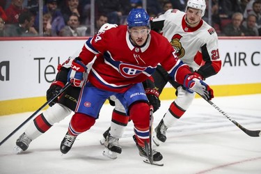 Montreal Canadiens Charles Hudon chases the puck in front of  Ottawa Senators Dylan DeMelo, obscured, and Logan Brown during first period of National Hockey League game in Montreal Wednesday November 20, 2019. (John Mahoney / MONTREAL GAZETTE) ORG XMIT: 63498 - 7635