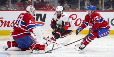 Montreal Canadiens goalkeeper Carey Price sticks his right leg out to stop shot by Antony Duclair of the Ottawa Senators, with help from defenceman Jeff Petry during second period of National Hockey League game in Montreal Wednesday November 20, 2019.