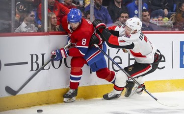Montreal Canadiens defenceman Ben Chiarot is checked by Brady Tkachuk of the Ottawa Senators during second period of National Hockey League game in Montreal Wednesday November 20, 2019.