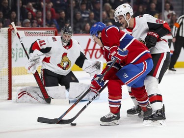 Montreal Canadiens forward Brendan Gallagher is checked by Cody Goloubef of the Ottawa Senators as he breaks in on Sens goalie Craig Anderson during first period of National Hockey League game in Montreal Wednesday November 20, 2019.