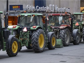 A convoy of tractors driven by farmers from south of the city drove to Canadian National headquarters in Montreal Friday November 22, 2019 to emphasize the difficulty a propane shortage caused by a strike by CN workers could be for the agricultural sector in the province.
