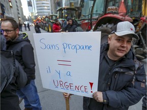 Rémi Brault of Ste-Martine joined the convoy of tractors driven by farmers from south of the city that drove to Canadian National headquarters in Montreal on Friday, Nov. 22, 2019, to emphasize the difficulty a propane shortage caused by a strike by CN workers could be for the agricultural sector in the province.