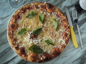 Vesta's Margherita pizza is loaded with mozzarella, fior di latte, pecorino and Parmesan cheeses.