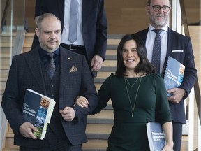 Montreal Mayor Valérie Plante arrives with Benoit Dorais to unveil the 2020 budget in November 2019.