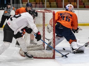 The Canadian National women's hockey team played an exhibition game against CEGEP Andre Laurendeau men's team at CEPSUM Arena in Montreal on Monday November 25, 2019. Team Canada Natalie Spooner is robbed of a wrap around goal by the outstretched stick of Andre Laurendeau Boomerang Justin Khouzam during 1st period exhibition action.