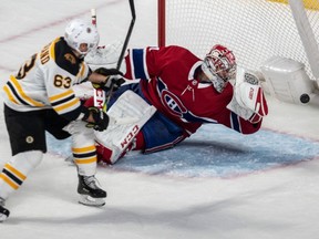 Bruins' Brad Marchand  scores an unassisted goal against Canadiens goaltender Carey Price late in the first period Tuesday night at the Bell Centre.