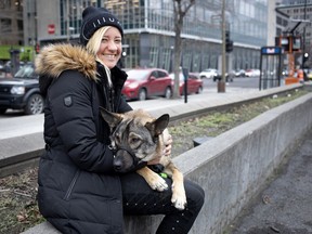 Jennifer Paquette and her dog, Clumsy. Paquette was arrested at 3:35 p.m. for intimidating a police officer and was detained for five hours before being released.