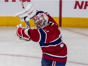 Canadiens goaltender Carey Price breaks his stick in frustration after allowing the fifth goal in a 6-4 loss to the New Jersey Devils in NHL game at the Bell Centre in Montreal on Nov. 28, 2019.