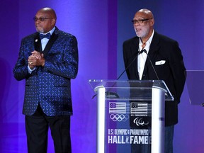 U.S. Olympic & Paralympic Hall of Fame inductee John Carlos and Tommie Smith speak during the Class of 2019 Induction Ceremony on Friday, Nov. 1, 2019, in Colorado Springs, Colo.