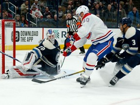 Blue Jackets goalie Joonas Korpisalo thwarts Canadiens' Joel Armia during third period action in Columbus on Tuesday night.