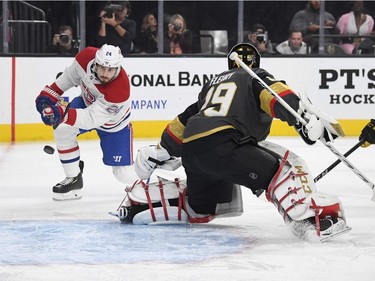 Phillip Danault of the Montreal Canadiens scores a first-period goal against Marc-Andre Fleury #29 the Vegas Golden Knights.