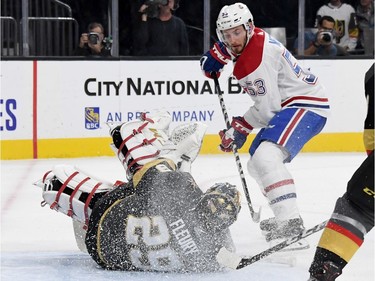 Marc-Andre Fleury #29 of the Vegas Golden Knights makes a save against Victor Mete #53 of the Montreal Canadiens in the third period. Coach Claude Julien credited the late-game attacks with the win.