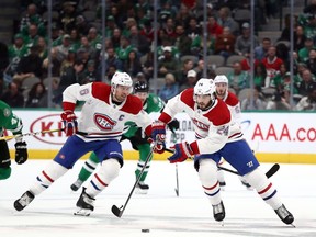 Canadiens' Phillip Danault #skates the puck against the Stars in the second period at American Airlines Center on Saturday, Nov. 2, 2019, in Dallas.