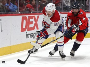 Jonathan Drouin of the Montreal Canadiens skates past Michal Kempny of the Washington Capitals during the first period at Capital One Arena on Nov. 15, 2019, in Washington, DC.