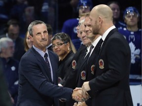 Guy Carbonneau is honoured for his induction to the Hockey Hall of Fame prior to the game between the Toronto Maple Leafs and the Boston Bruins at the Scotiabank Arena on Nov. 15, 2019, in Toronto.