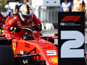 Second place qualifier Sebastian Vettel of Germany and Ferrari climbs from his car in parc ferme during qualifying for the F1 Grand Prix of Brazil at Autodromo Jose Carlos Pace on November 16, 2019 in Sao Paulo, Brazil.