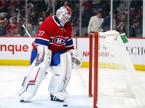 Canadiens goalie Keith Kinkaid fishes the puck out of the net after giving up game-winning goal in overtime to the Philadelphia Flyers' Ivan Provorov during NHL game at the Bell Centre in Montreal on Nov. 30, 2019. The Flyers won 4-3.