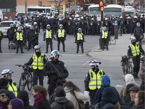 Hundreds of protesters are kettled by police on de Maisonneuve Blvd. E. after leaving Place Emilie Gamelin in Montreal Quebec, during a protest against the municipal bylaw requiring protesters to supply police with a route and not wear masks Friday, April 5, 2013.