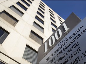 Signage outside the de Maisonneuve Blvd. offices in Montreal of youth-protection agency Direction de la protection de la jeunesse (DPJ), on Wednesday, Nov. 6, 2019.