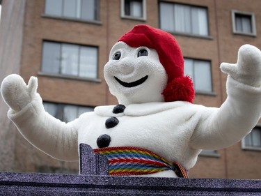 The Bonhomme Carnaval waves to the crowd during the annual Santa Claus parade in Montreal on Saturday, Nov. 23, 2019.