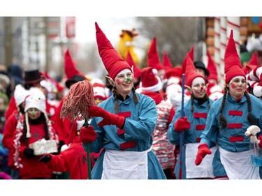 Elves perform during the annual Santa Claus parade in Montreal on Saturday, Nov. 23, 2019.