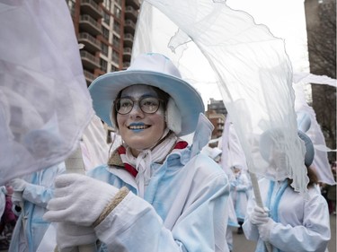 Performers from La Fée des étoiles take part in the annual Santa Claus parade in Montreal on Saturday, Nov. 23, 2019.