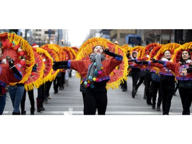 Performers from Montreal's Chinese community take part in the annual Santa Claus parade in Montreal on Saturday, Nov. 23, 2019.