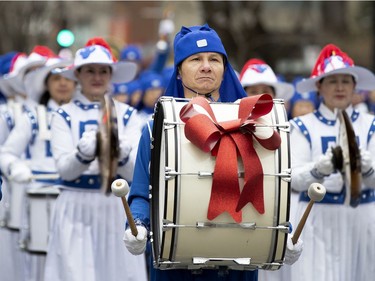 Performers of Falun Dafa take part in the annual Santa Claus parade in Montreal on Saturday, Falun Dala