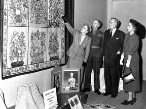 "Queen Mary's special gros point carpet, purchased by the Imperial Order Daughters of the Empire, has arrived in Montreal and now is on view at Eaton's," we reported on Nov. 28, 1950. In this photo from our archives, Mrs. R.W. Walkley of Toronto, the IODE's national organizing secretary, points out details of the intricate work, composed of 12 panels each measuring 27 by 23 inches, and a border. With her are Maj.-Gen. R.O.G. Morton, Councillor W.R. Bulloch and Mrs. Paul Kurhing, regent of the Montreal municipal chapter of the IODE.