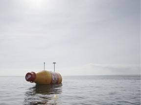 The world's largest message-in-a-bottle is released to the ocean in Santa Cruz de Tenerife on March 13, 2013. The 8 meter long bottle, which contains a case of Norwegian soft orange drink and a 12 square meter letter, is equipped with navigation lights required for a drifting object in international waters, solar panels, satellite-communications, tracking technology and a custom camera. AFP PHOTO / DESIREE MARTINDESIREE MARTIN/AFP/Getty Images