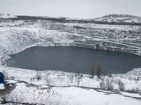 The old Jeffrey mine pit in Asbestos is seen on Dec. 18, 2018. Quebec closed its last asbestos mine in 2012, and the sale and use of the deadly fibre is now banned in Canada.