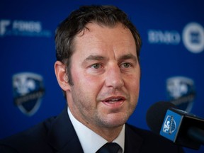 Impact sporting director Olivier Renard listens as Thierry Henry is introduced as the club's new head coach in Montreal on Nov. 18, 2019.