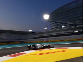 Mercedes' British driver Lewis Hamilton steers his car during the qualifying session at the Yas Marina Circuit in Abu Dhabi, a day ahead of the final race of the season, on November 30, 2019. (Photo by GIUSEPPE CACACE / AFP)