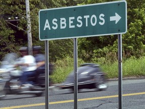 A sign directs the way to Asbestos, Quebec on Thursday, June 29, 2006.
