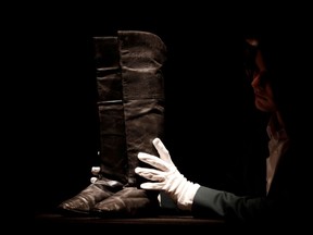 These boots, expected to fetch 80,000 euros ($88,176) at auction in Paris on Friday are believed to have been worn by French statesman Napoleon during his final exile in Saint-Helena.