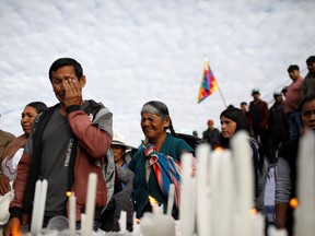 Coca farmers and supporters of Bolivia's ousted President Evo Morales mourn the death of a man, who they say was killed by security forces during recent skirmishes, in Sacaba, near Cochabamba, Bolivia November 17, 2019. REUTERS/Marco Bello