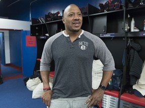 Montreal Alouettes' John Bowman speaks to reporters as players clean out their lockers in Montreal on Nov. 11, 2019, after being eliminated in the playoffs by the Edmonton Eskimos on Sunday.