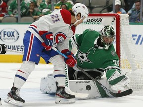 Dallas Stars goaltender Ben Bishop blocks a shot against Montreal Canadiens' Nick Cousins  in the first period at the American Airlines Center  on Saturday, Nov. 2, 2019.