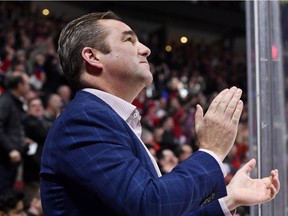 Canadiens owner/president Geoff Molson applauds after Tomas Tatar scored goal en route to a 3-2 shootout victory over the Columbus Blue Jackets at the Bell Centre in Montreal on Nov. 12, 2019.